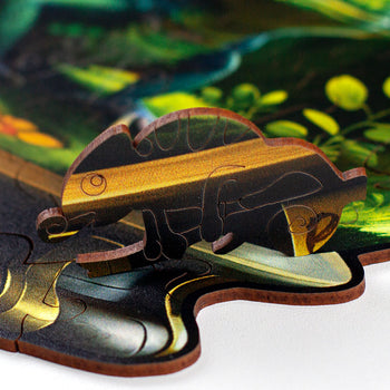 Detalhe da peça de madeira do Puzzle Orbe Camaleão