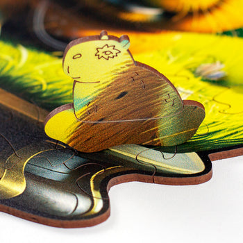 Detalhe da peça de madeira do Puzzle Orbe Capivara
