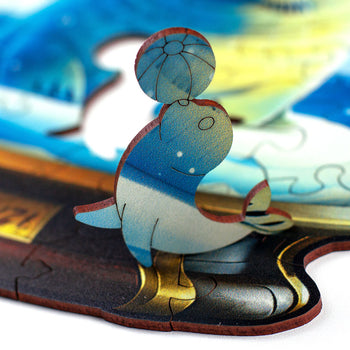 Detalhe da peça de madeira do Puzzle Orbe Foca