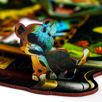 Detalhe da peça de madeira do Puzzle Orbe Onça