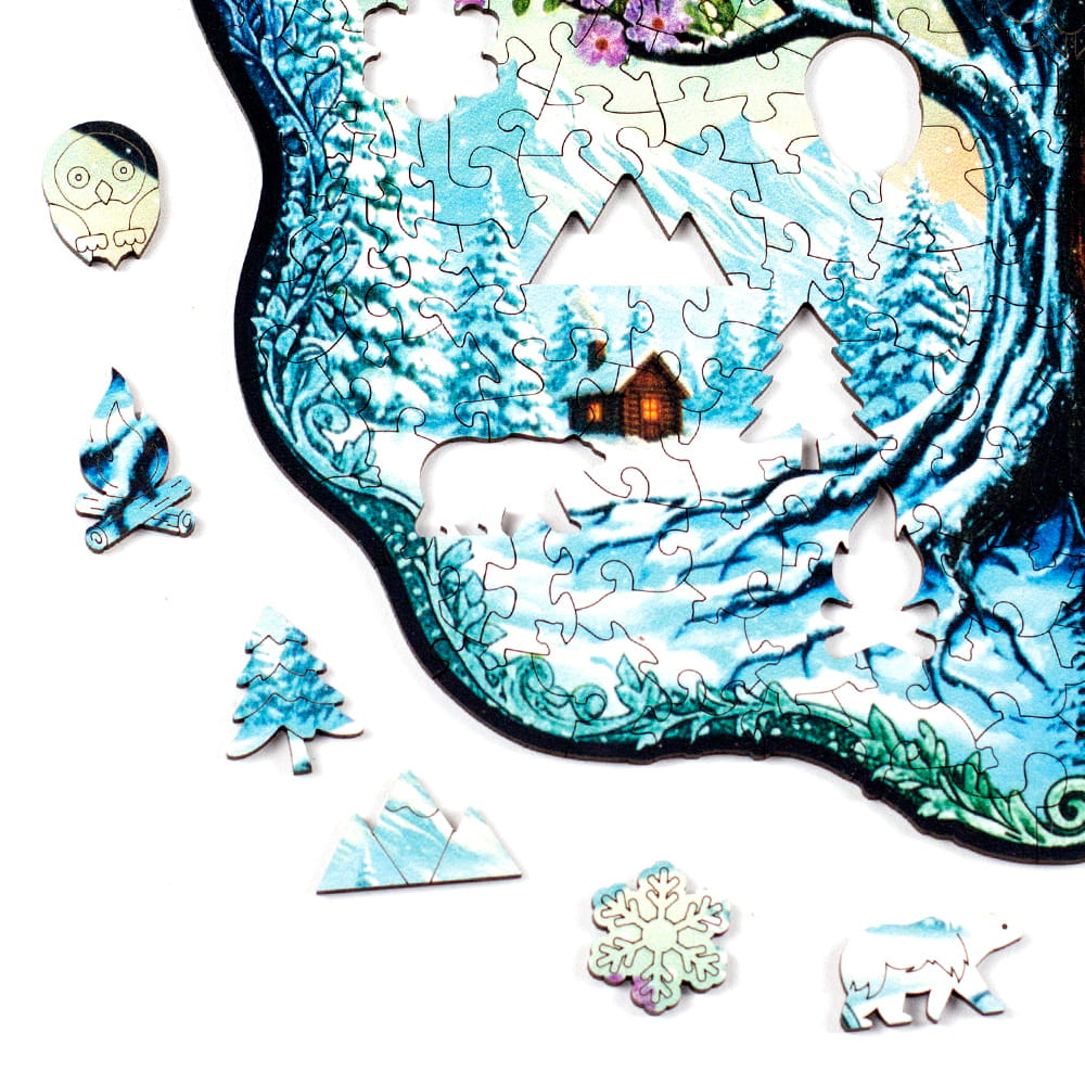 Peças temáticas da estação do inverno que incluem coruja, floco de neve, pinheiro, fogueira, montanha nevada e urso polar